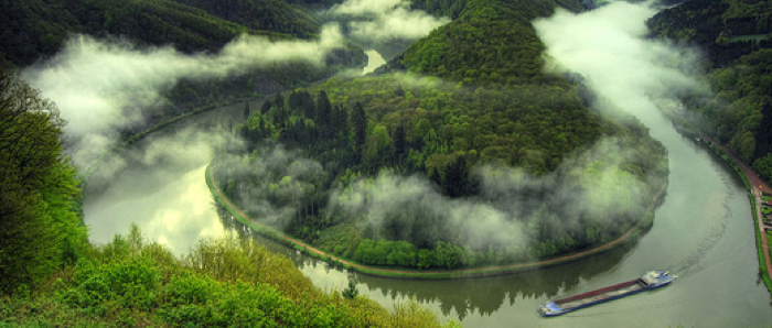 The winding and misty Saar River, Germany